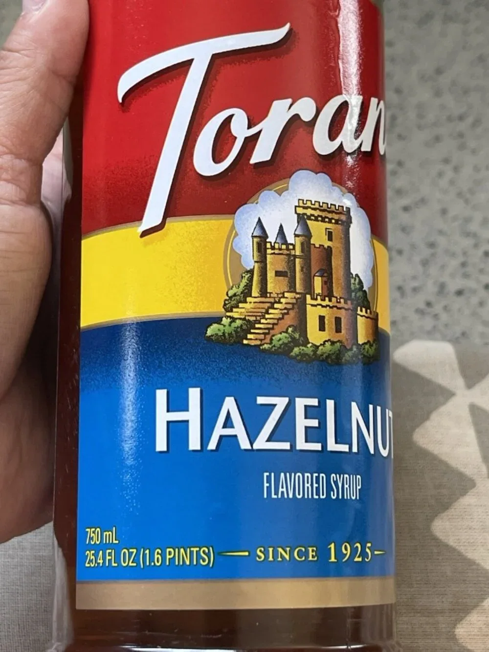 Torani Hazelnut Syrup, 750 ml 25.4 OZ G-Hazelnut Exp Date: April 7. 2027